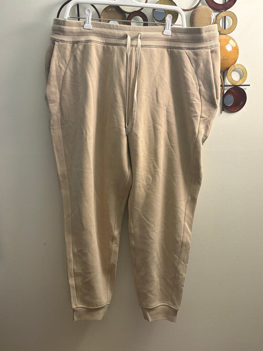 Women’s plus Lululemon fleece lined tan joggers size 18 with gummy tan logo